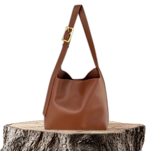 Bolso de hombro de piel Ela de Vega Madrid, con asa ajustable y acabado elegante en color marrón.