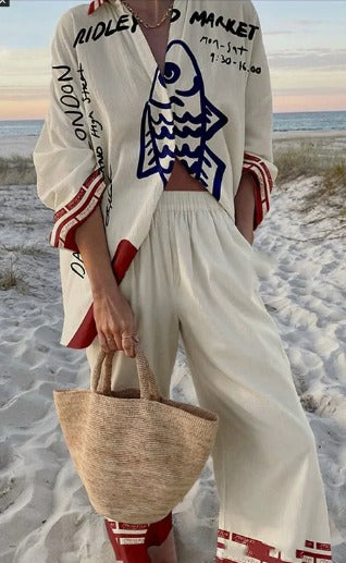 Conjunto de dos piezas Úrsula de Vega Madrid con camisa estampada y pantalón fluido en color relajado.