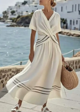 Vestido largo de diseño mediterráneo Claudia de Vega Madrid, con detalles elegantes y estilo sofisticado para ocasiones especiales.