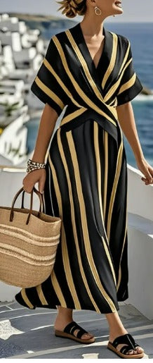 Vestido largo Claudia de diseño mediterráneo de Vega Madrid, con estampados y detalles elegantes en tela fluida.
