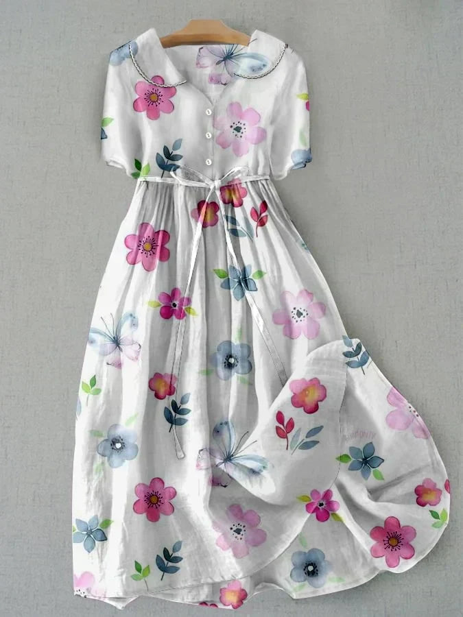 Vestido Aveline Butterfly Bloom de Vega Madrid para mujer, con estampado floral y tela ligera de algodón y lino para verano.