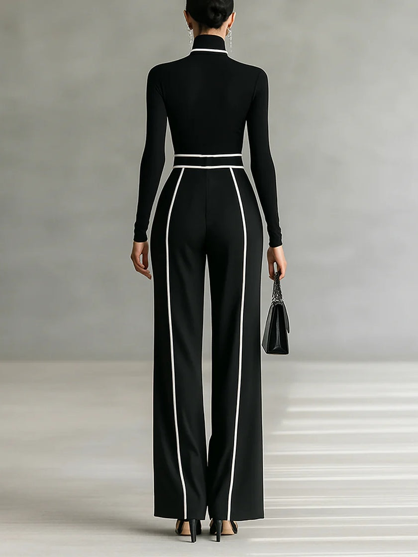 Conjunto elegante Inés de Vega Madrid con detalles en contraste, diseño sofisticado y moderno para ocasiones especiales.