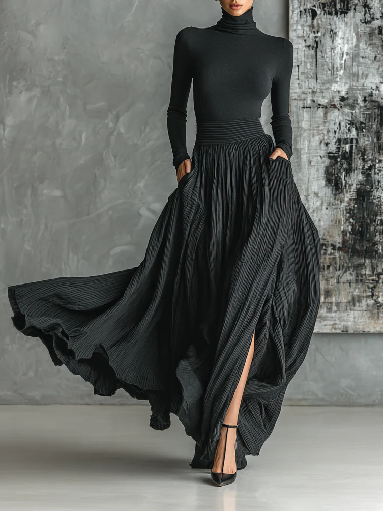 Conjunto elegante Ingrid de Vega Madrid con blusa y falda plisada en color neutro, vista frontal del conjunto completo.