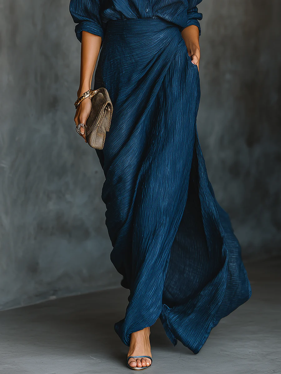 Conjunto elegante Ivanna de Vega Madrid con falda larga y top ajustado, en tonos neutros, para eventos formales y ocasiones especiales.