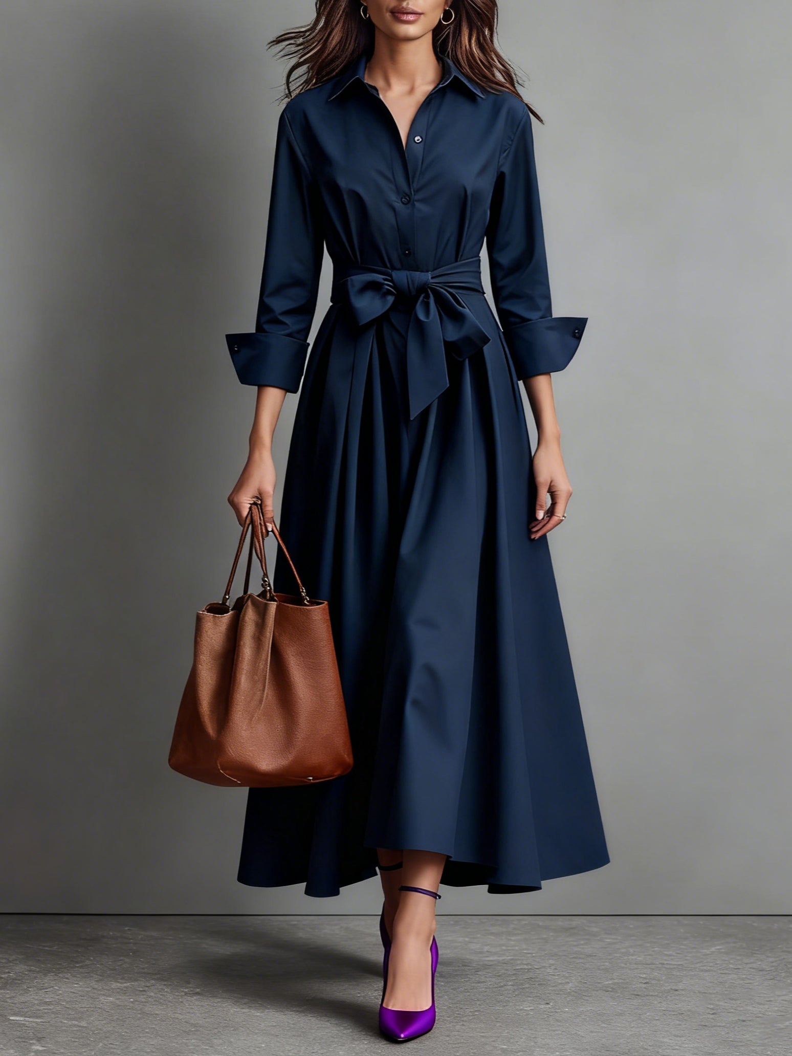 Vestido elegante Vega Madrid Marisa con detalle de lazo, diseño sofisticado y femenino en tela lisa de color neutro.