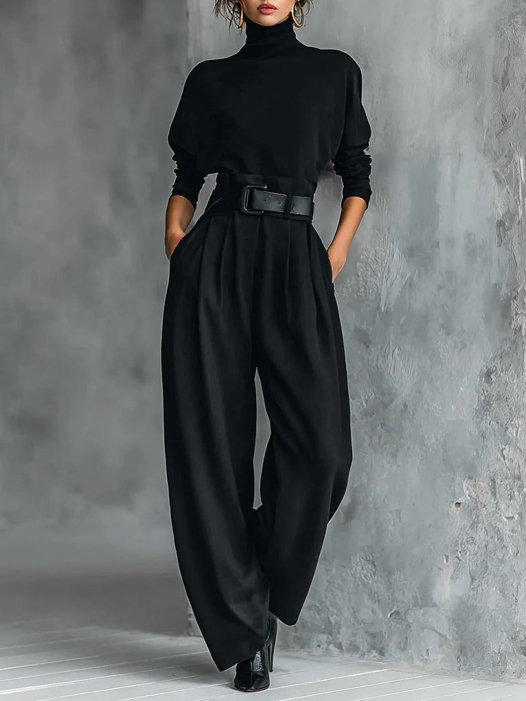 Conjunto negro Lisa de Vega Madrid con cinturón, ropa elegante y moderna, mostrado en la imagen con detalles del diseño.