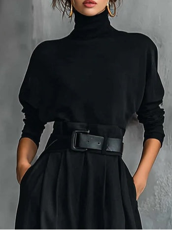Conjunto negro Lisa de Vega Madrid con cinturón, ropa elegante y moderna, vista frontal en color oscuro y estilo sofisticado.