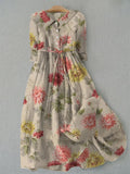 Vestido vintage Zinnia de Vega Madrid con lazo en la cintura y diseño floral, combina estilo clásico y comodidad moderna.