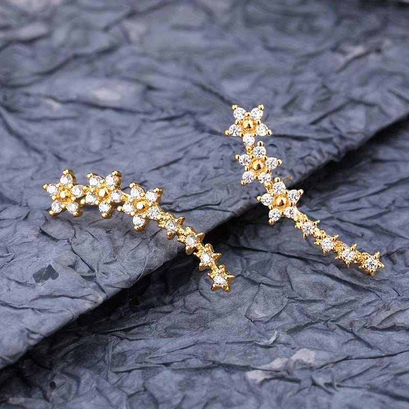 Pendientes florales elegantes de Vega Madrid con diseño delicado y detalles en tonos suaves, para un estilo sofisticado y femenino.