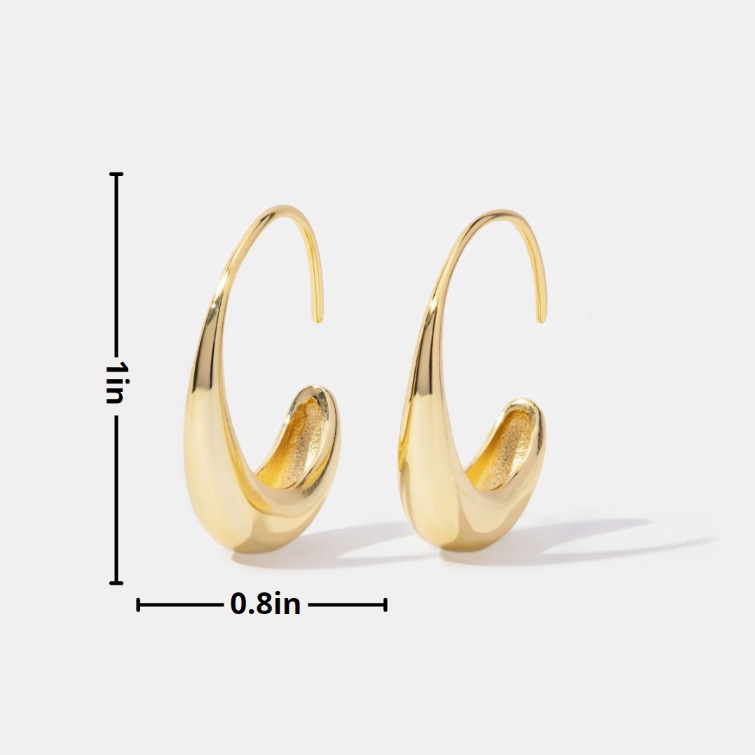 Pendientes de aro colgantes de la marca Vega Madrid, estilo clásico con diseño elegante y acabado en metal.