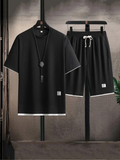 Black Bruno casual summer set from Vega Madrid featuring a stylish top and matching shorts.