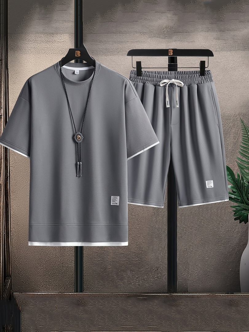 Gray casual summer set from Vega Madrid, featuring a lightweight design ideal for warm weather outings.