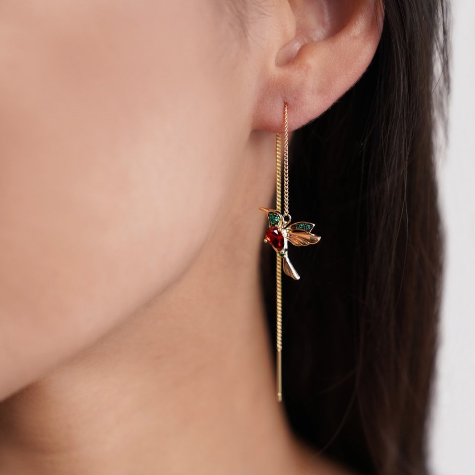 Pendientes colibrí de cristal y borla de Vega Madrid, pendientes de moda con diseño de colibrí y detalles brillantes.
