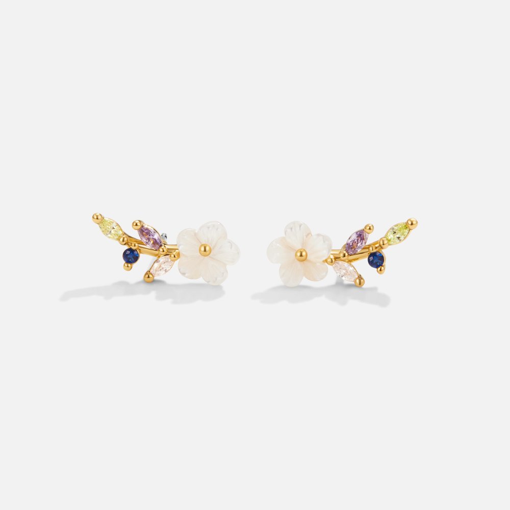Pendientes de aro en cristal blanco con diseño floral Blossom de Vega Madrid, joyería elegante y moderna para ocasiones especiales.