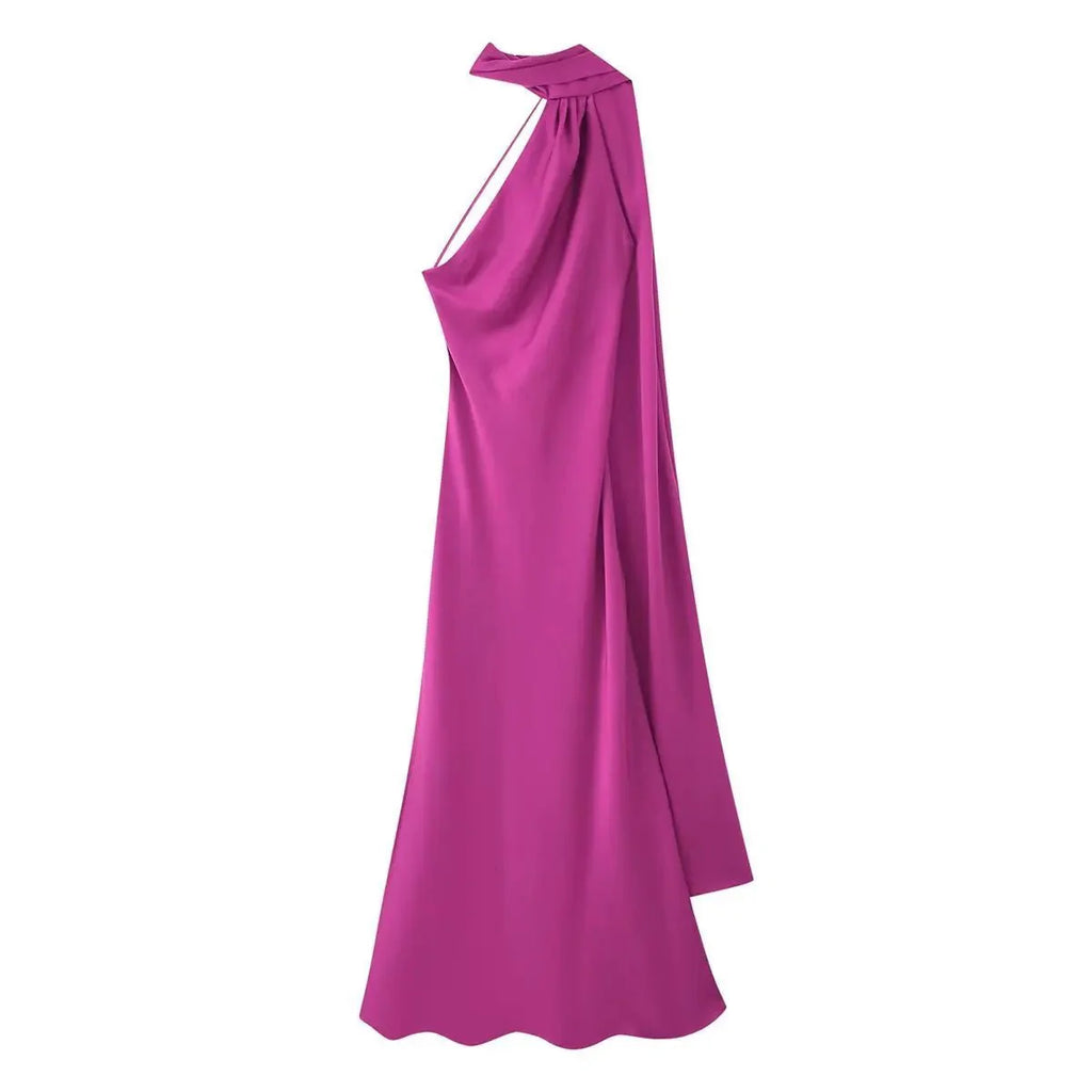 Vestido Mistral Aurora de Vega Madrid en tela suave con estampado floral y corte elegante, mostrado en color vibrante.