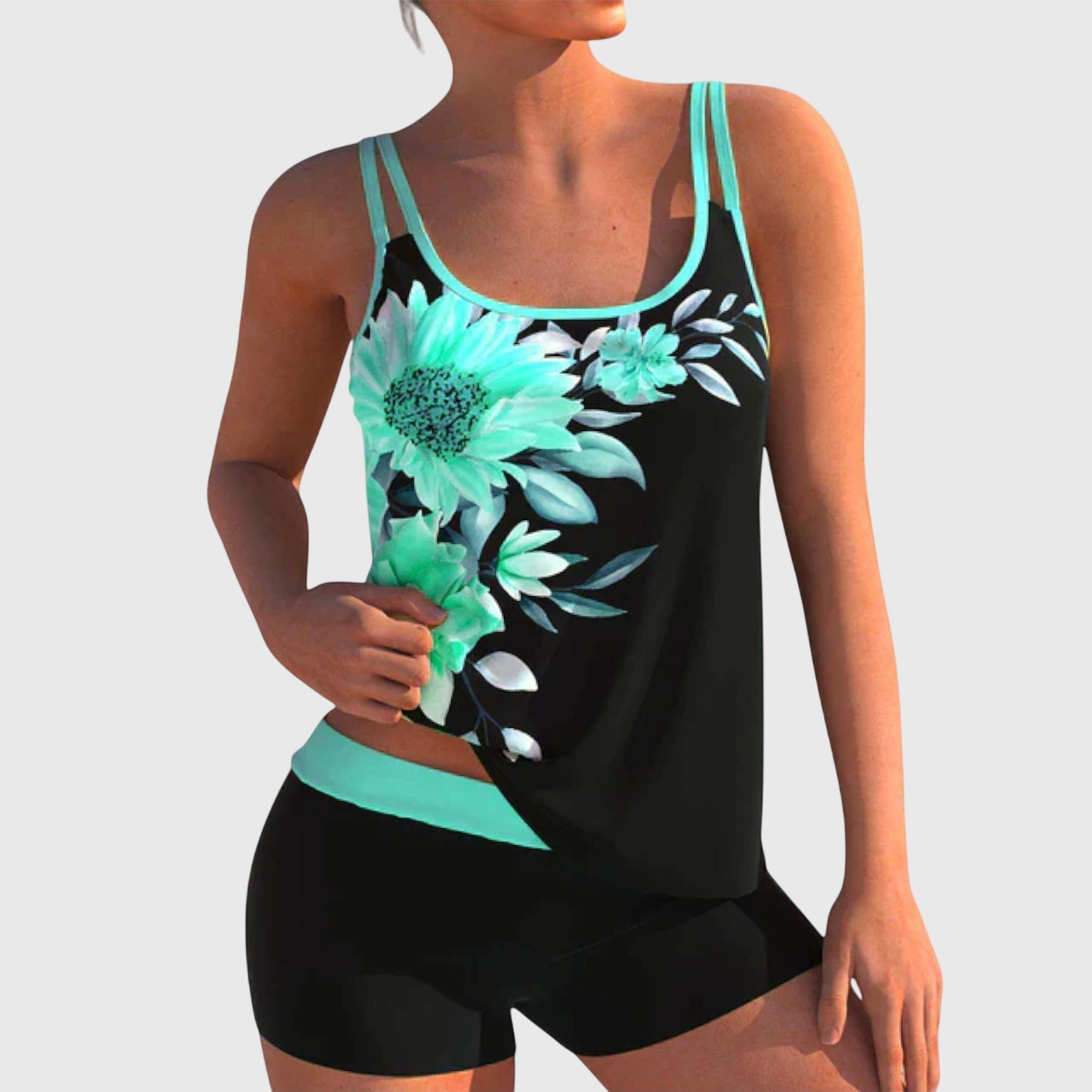 Conjunto de tankini floral con short y efecto vientre plano de Vega Madrid, ideal para playa y piscina, con diseño colorido y cómodo.