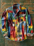 Camisa Arturo de Vega Madrid con diseño de mosaico en colores vibrantes y patrón geométrico visible en la imagen.