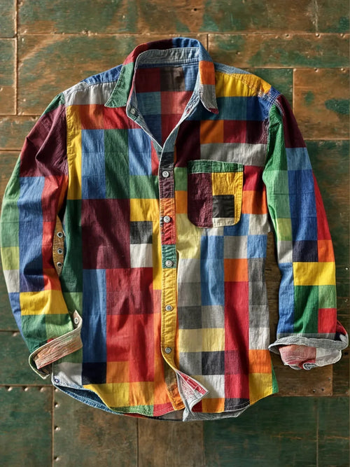 Camisa Arturo de Vega Madrid con diseño de mosaico en colores vibrantes y patrón geométrico visible en la imagen.