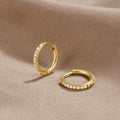 Pendientes de aro Eternidad de Vega Madrid, pendientes de aro grandes y elegantes con diseño infinito en plata brillante.