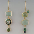 Pendientes verdes vintage de Vega Madrid con diseño elegante y detalles en tonos verdes, visibles en la imagen.