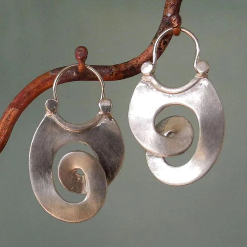 Pendientes de espiral color plata vintage de Vega Madrid, diseño elegante y llamativo para mujer.