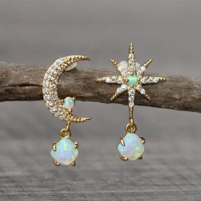 Pendientes de perla clásicos con estrellas de Vega Madrid, elegantes pendientes de perla blanca y diseño sofisticado.