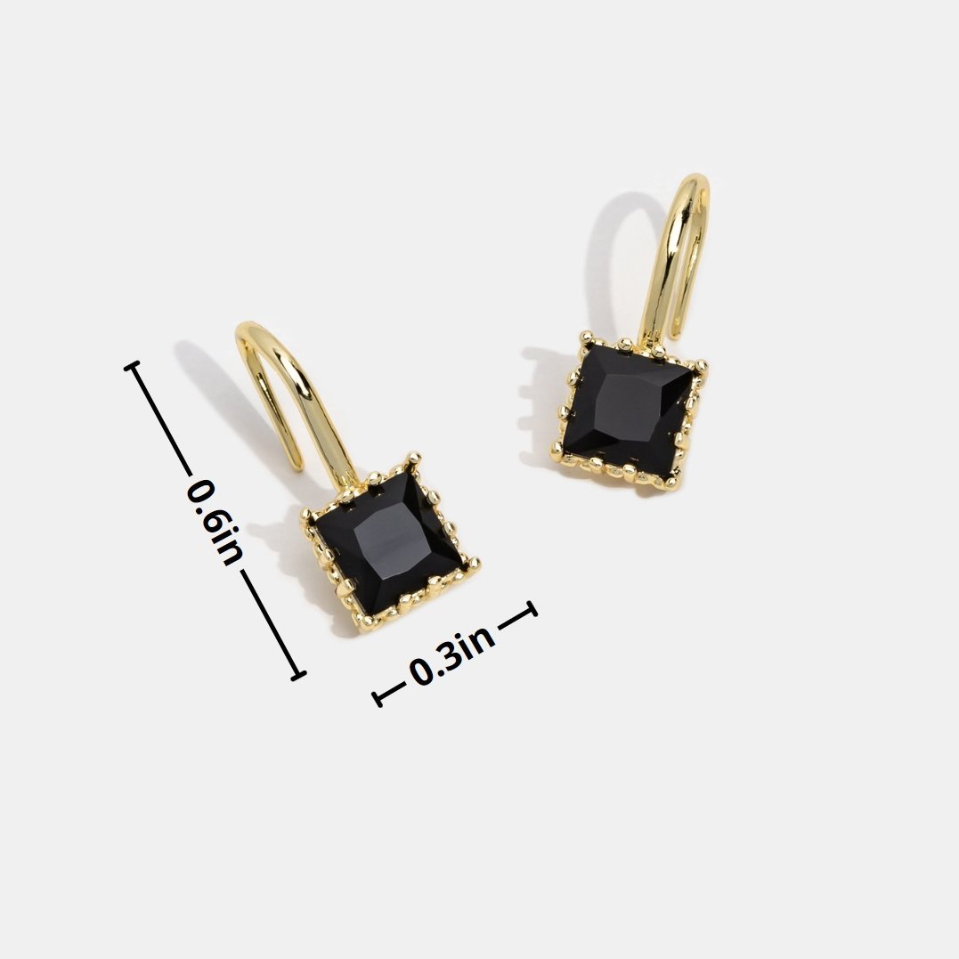 Pendientes colgantes Wonder Crystal de Vega Madrid con cristales negros y diseño elegante.